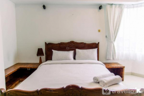 Elegant 2BR with Extra Room Apartment at Sudirman Tower Condominium By Travelio